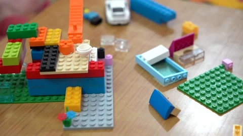 Kid playing with blocks Stock Footage 146157655