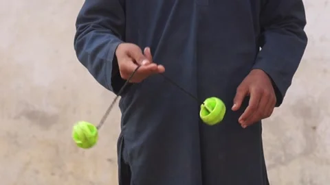 Kid Playing Clackers Balls, pov 動画素材 293156020