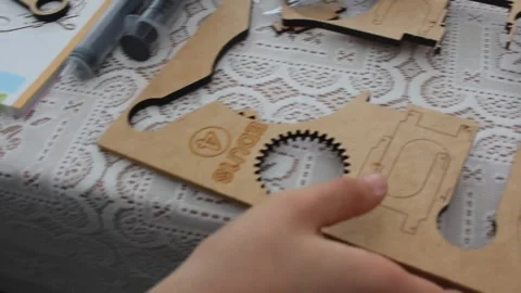 Kid playing with a construction game Stock Footage 241440998