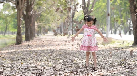 Kid playing in the garden Stock Footage 51165943