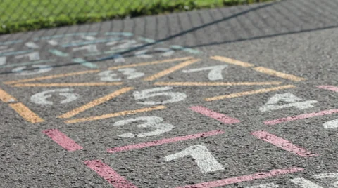 Kid playing hopscotch Stock Footage 30567580