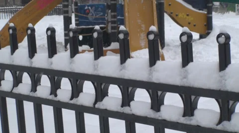 Kid Playing In Park During Snow Storm Tilt-Shot Vídeo Stock 34974407