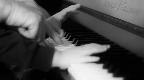 Kid playing piano Stock Footage 32876369