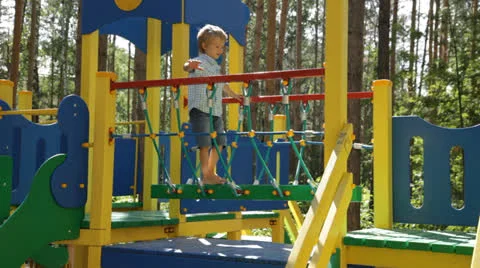 Kid Playing in Public Playground Stock Footage 25591919