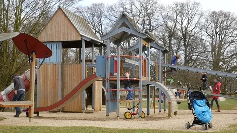 Kid Playing In Public Playground Stock Footage 72682621