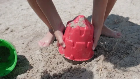 Kid playing in sand at beach Stock Footage 163124501