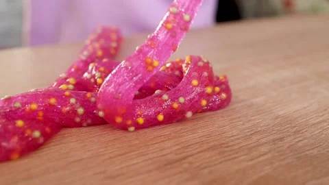 Kid playing with slime, child development concept Stock Footage 221330238