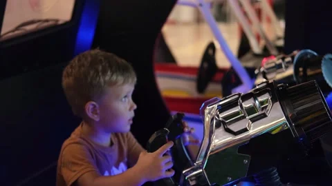 The kid is playing a slot machine. Stock Footage 160048684