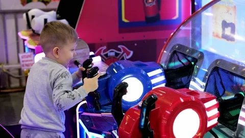The kid is playing a slot machine. Stock Footage 170256937