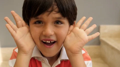 Kid playing surprise game Stock Footage 88908790
