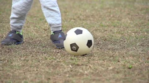 Kid playing tootball Stock Footage 51755927