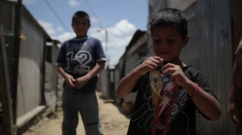 Kid playing with top in Guatemala Stock Footage 61158032