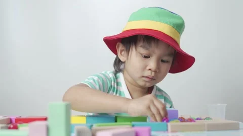 Kid playing toy blocks. 스톡 동영상 194383785