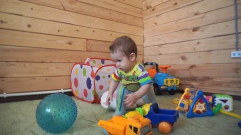 The kid is playing with toys. Stock Footage 74642271