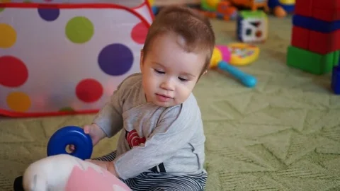 The kid is playing with toys. Stock Footage 74642767
