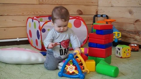The kid is playing with toys. Stock Footage 74643148