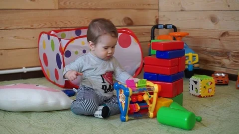 The kid is playing with toys. Stock Footage 74643356