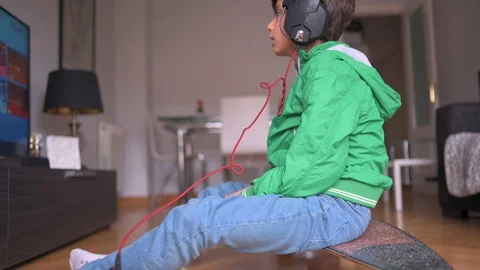 Kid playing with a video game console at home Stock-Footage 116270432