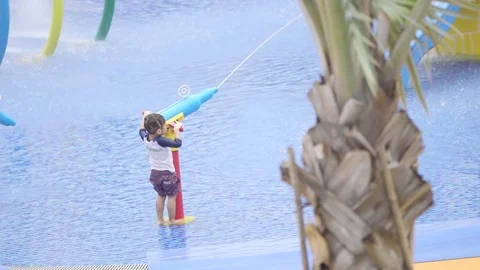 Kid Playing at Waterpark Stock Footage 78472898