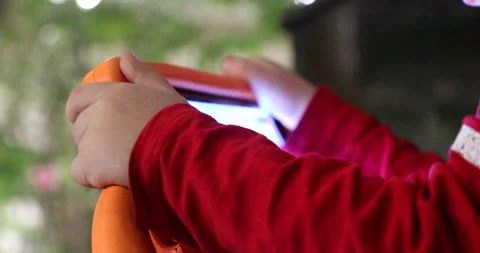 Kid playing witg a tablet Stock Footage 168116401