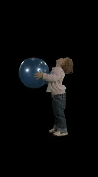 Kid plays with ball. Stock Footage