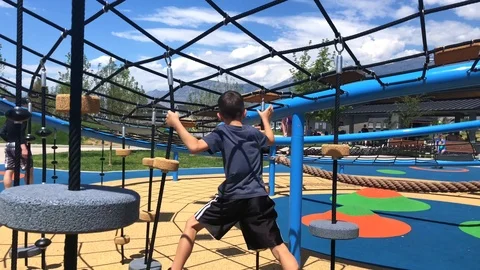 Kid on plays ropes Stock Footage 92926637