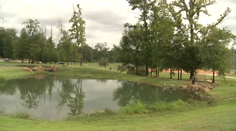 Kid at pond Stock Footage 916128
