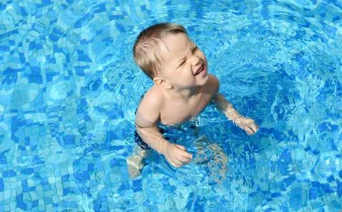 Kid in the pool Stock Photos
