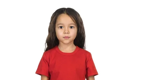 Kid posing surprisingly on white background. Slow motion Stock Footage 114294722