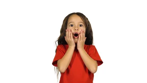 Kid posing surprisingly on white background. 4k Stock Footage 114325372