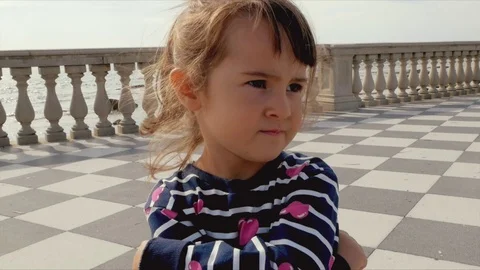 A kid pouts then smiles  Stock Footage 80491781