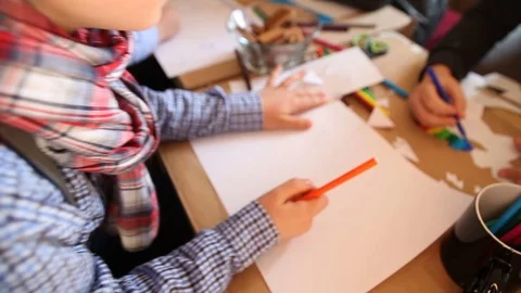 Kid preparing to make a drawing Stock Footage 73020424