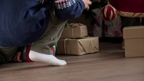 Kid preparing surprise for Christmas Stock Footage 219317288