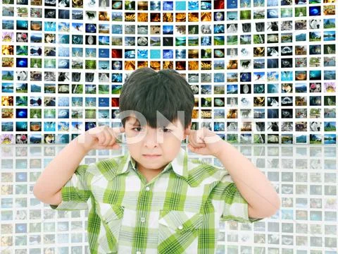 Kid protecting ears from loud noise of so many screens talking Stock Photos