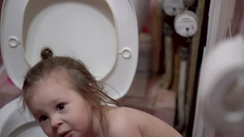 Kid put his hand open Toilet Lid, Close Up. White Bathroom Vídeos de archivo 153503465