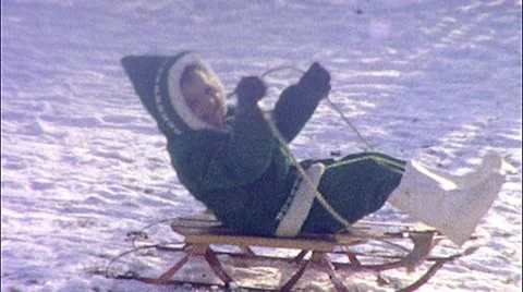 Kid Rides Sled Downhill Sledding Winter Sport 1950s Vintage Film Home Movie Stock Footage