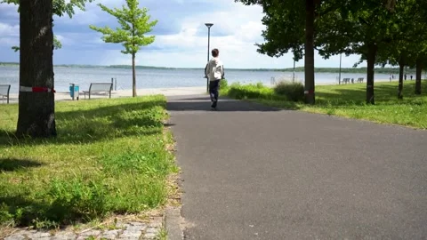 Kid riding scooter Stock Footage 338251341