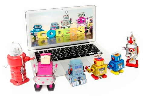 Kid robots learn code on a laptop computer Stock Photos