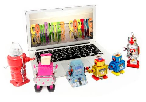 Kid robots learn code on a laptop computer Stock Photos