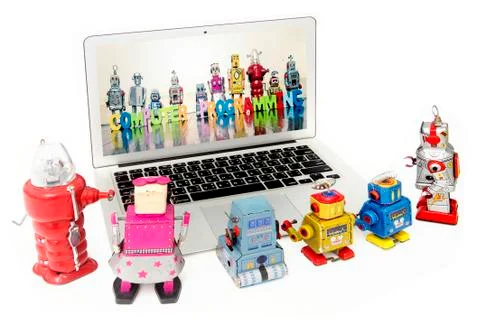 Kid robots learn code on a laptop computer Stock Photos