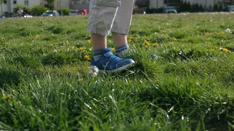 Kid running on field. Active boy on nature. Slow motion Stock Footage 131096464