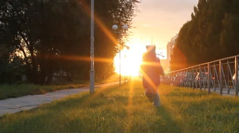 Kid running on meadow silhouette Stock Footage 57814118