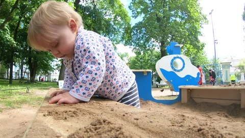 Kid in the sandbox Video stock 135899227