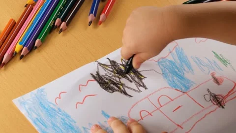 Kid scribbling picture Stock Footage 218021238