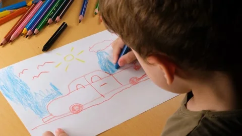Kid scribbling picture Stock Footage 229650559