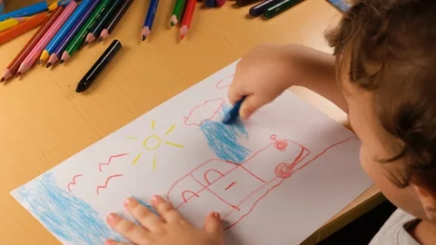 Kid scribbling picture Stock Footage 237746122
