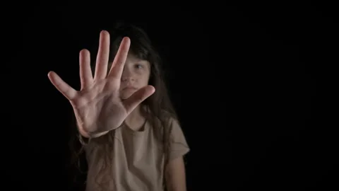 Kid show stop gesture on black. Stock Footage 254031152