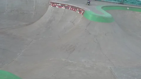 Kid skateboarding in a skatepark full run Stock Footage 43200636