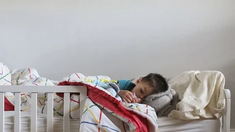Kid sleeping during naptime, video Stock Footage 79659408