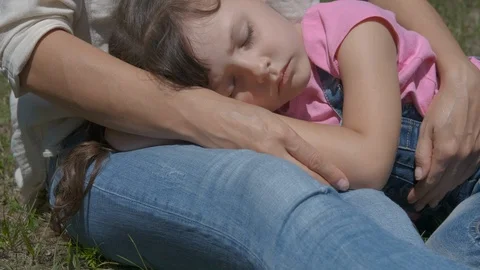 The kid sleeps in nature. Stock Footage 125870345